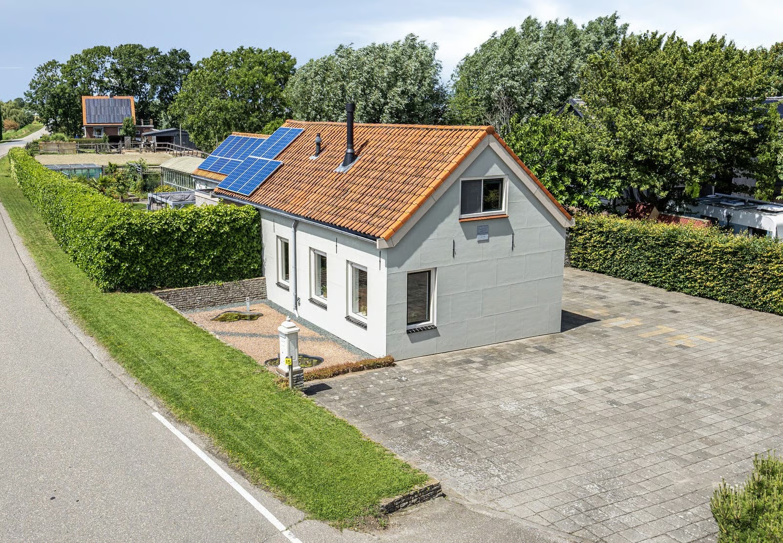 Vrijstaande woning (dijkwoning) Ruigendijk 15 in Tinte