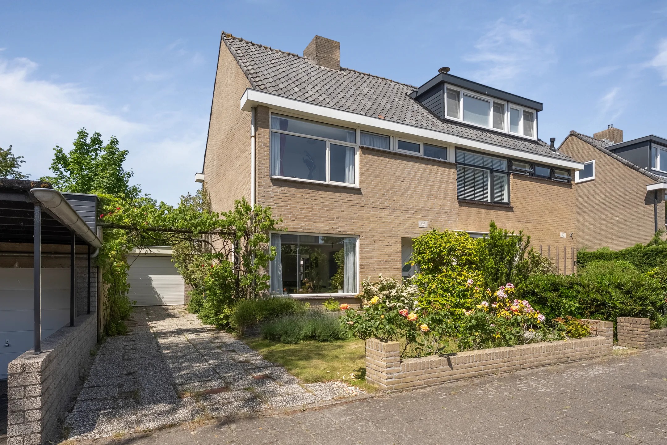 2-onder-1-kapwoning Woudweg 19 in Vijfhuizen