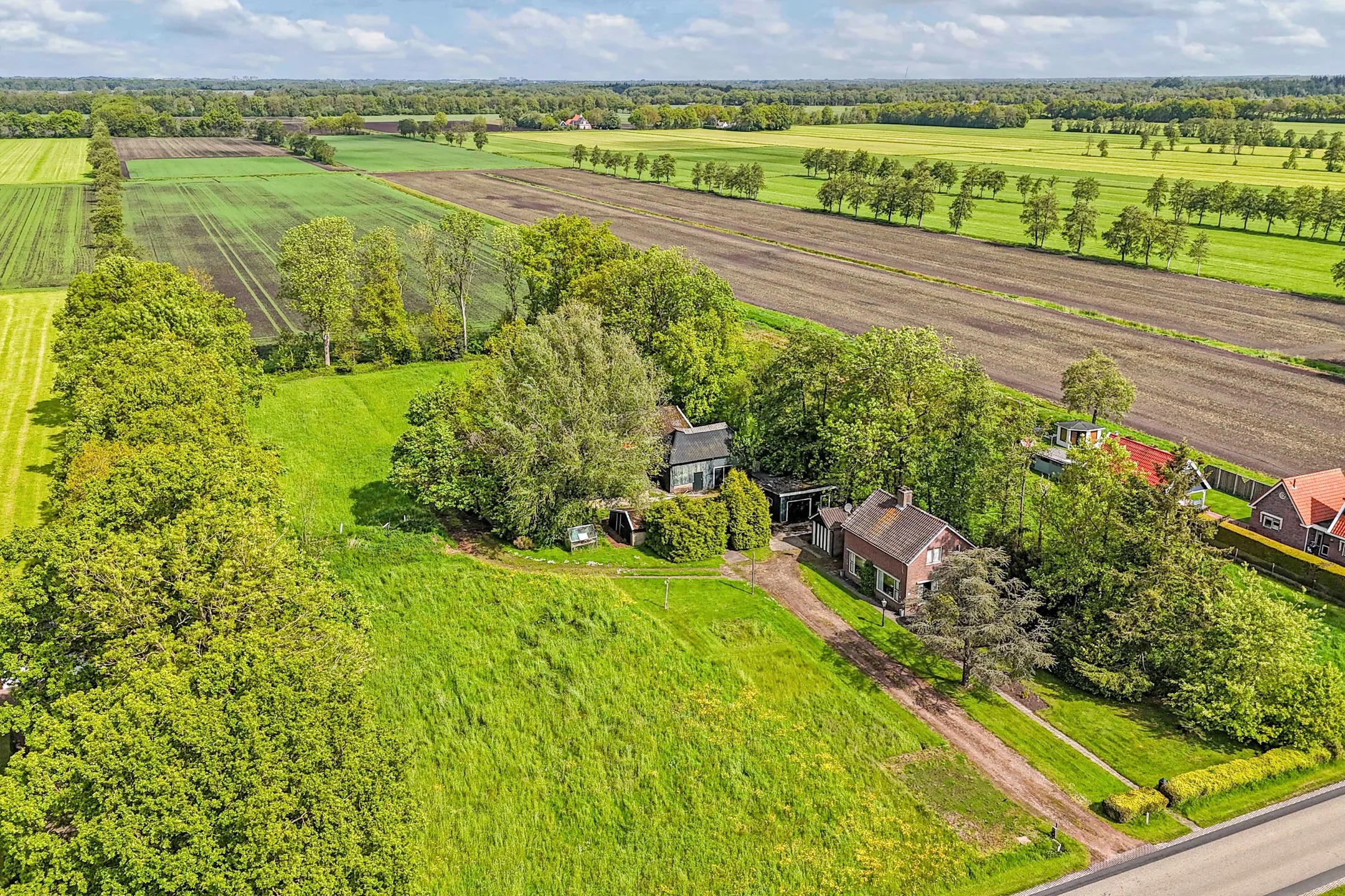 Vrijstaande woning (bedrijfs- of dienstwoning) Weinterp 64 in Wijnjewoude