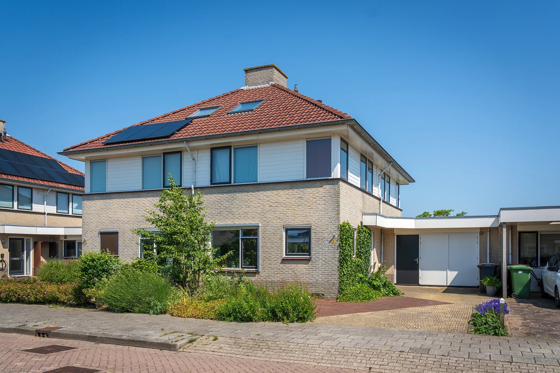 Geschakelde 2-onder-1-kapwoning Hoefslag 47 in Den Burg