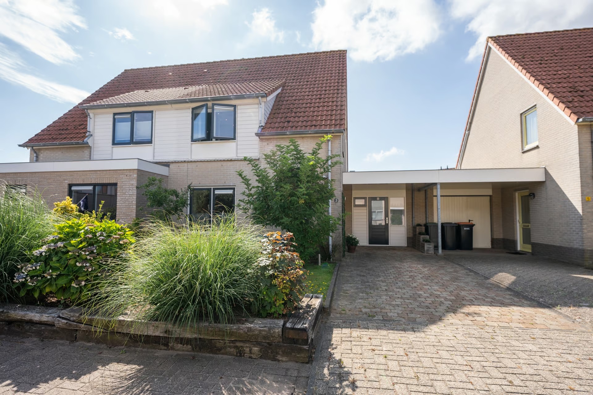 Geschakelde 2-onder-1-kapwoning Waardwei 3 in Den Burg