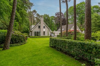 Villa, geschakelde 2-onder-1-kapwoning Duinweg 12 in Bosch en Duin