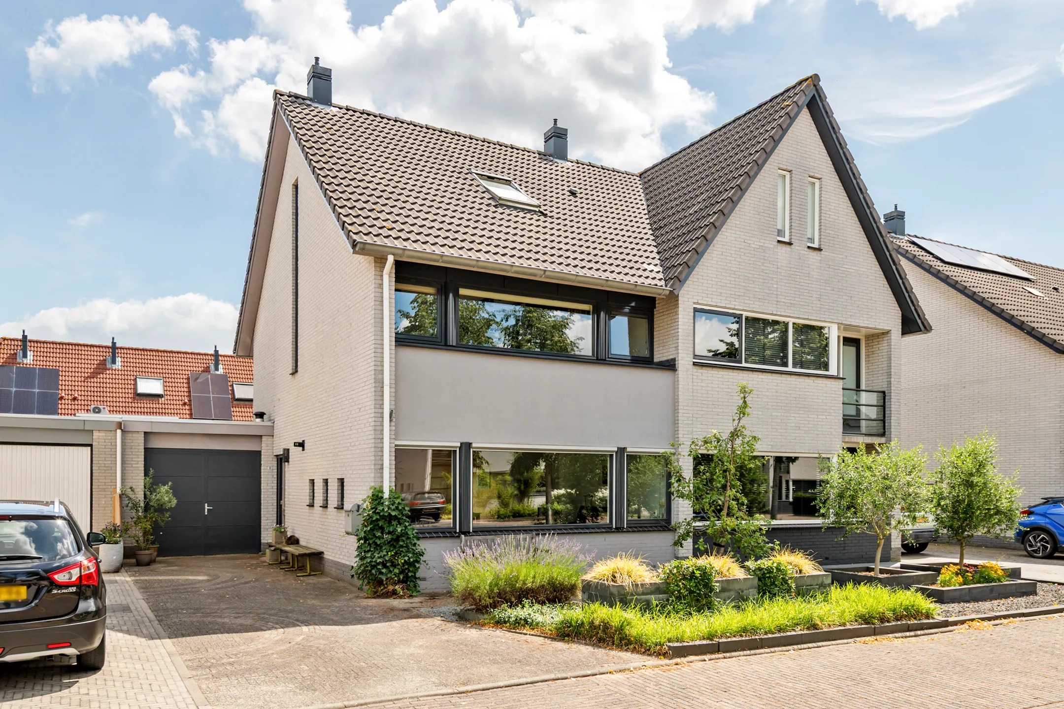 2-onder-1-kapwoning Laan 1940-1945 20 in Meteren