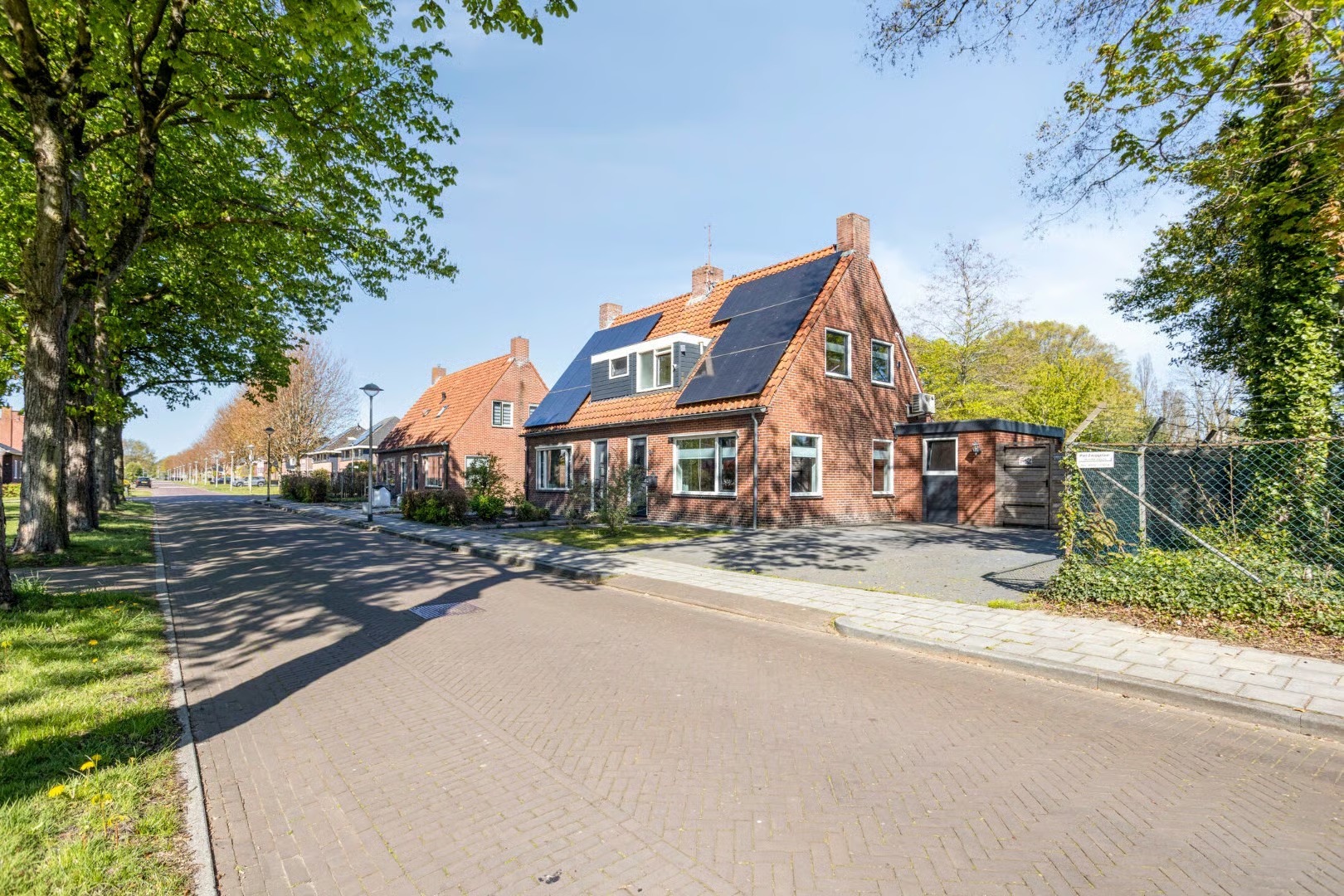 2-onder-1-kapwoning Langeweg 1 in Scheemda
