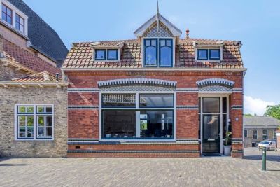Eengezinswoning, geschakelde woning (dijkwoning) Noorddijkstraat 5 in Brouwershaven