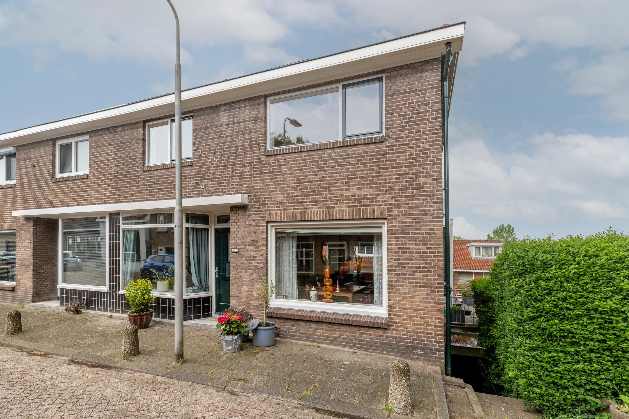 Hoekwoning (dijkwoning) Ringdijk 27 a in Ridderkerk
