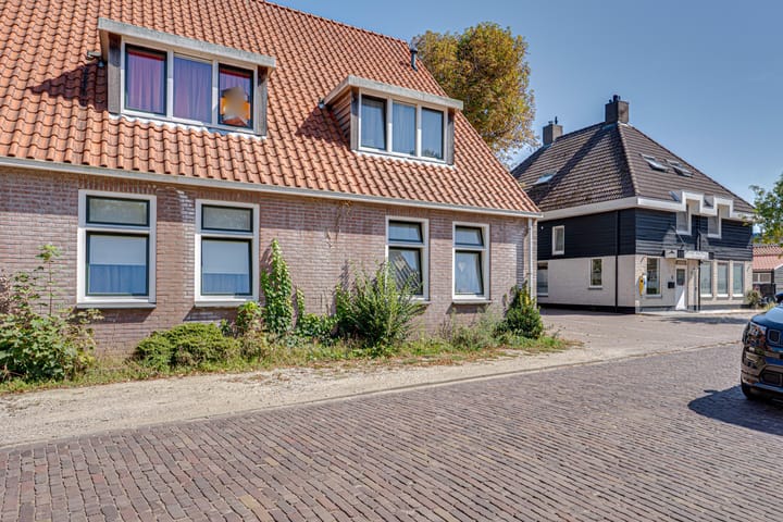 Benedenwoning (appartement met open portiek) Weststraat 2 a in Kortgene