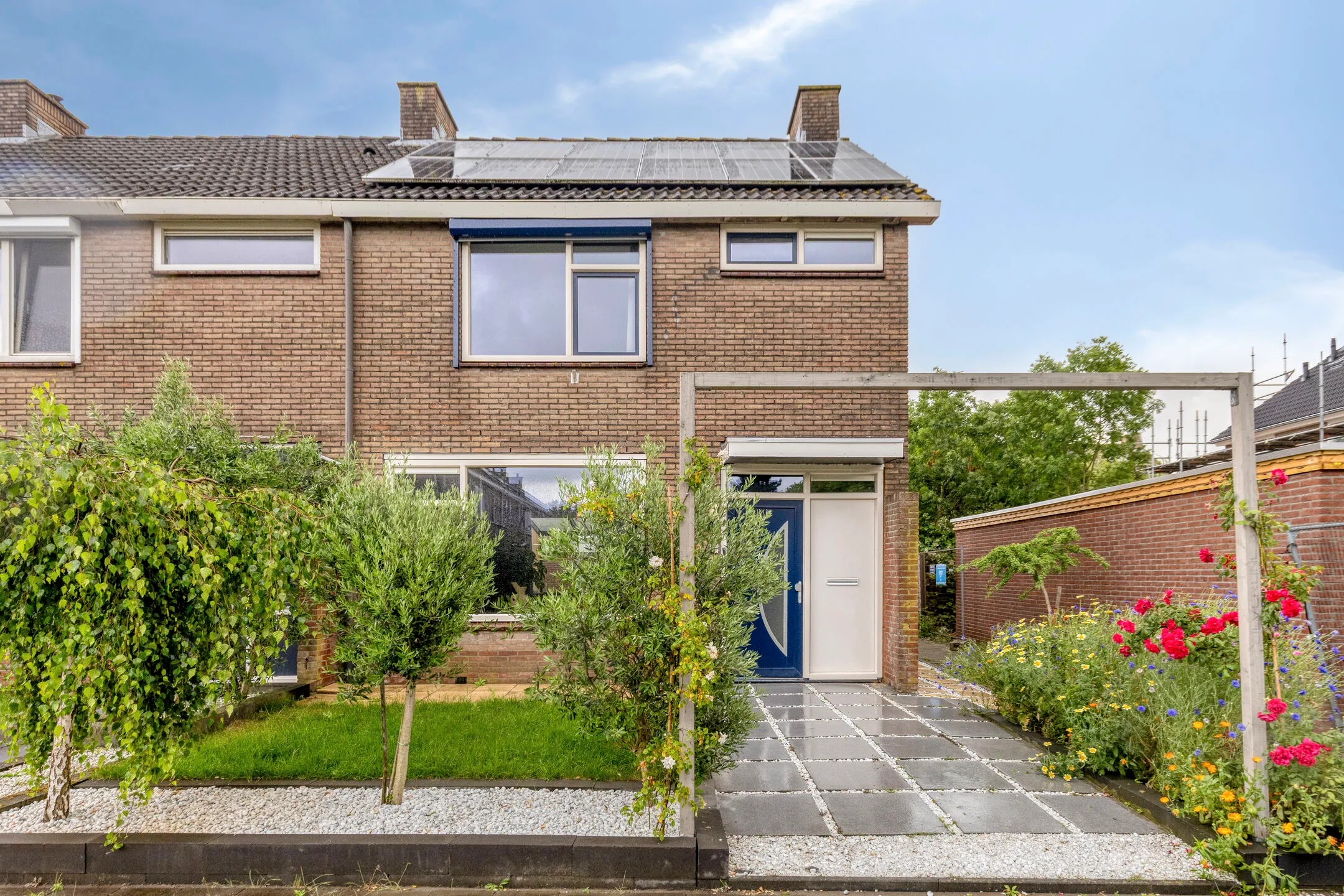 Hoekwoning (hofjeswoning) Doormanstraat 37 in Koudekerke